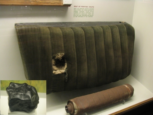Photo of the car seat and muffler hit by the Benld meteorite
