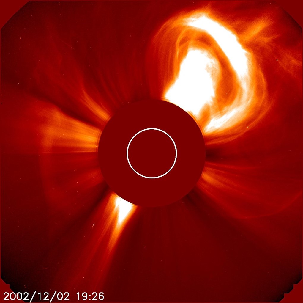 This image shows a very large CME blasting off into space on December 2, 2002.