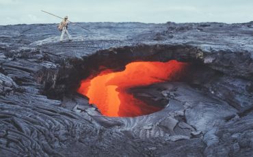 A peek through a "skylight" into the interior of an active lava tube on the south flank of the Kīlauea Volcano on Hawai‘i’s big island in the early 1970s.