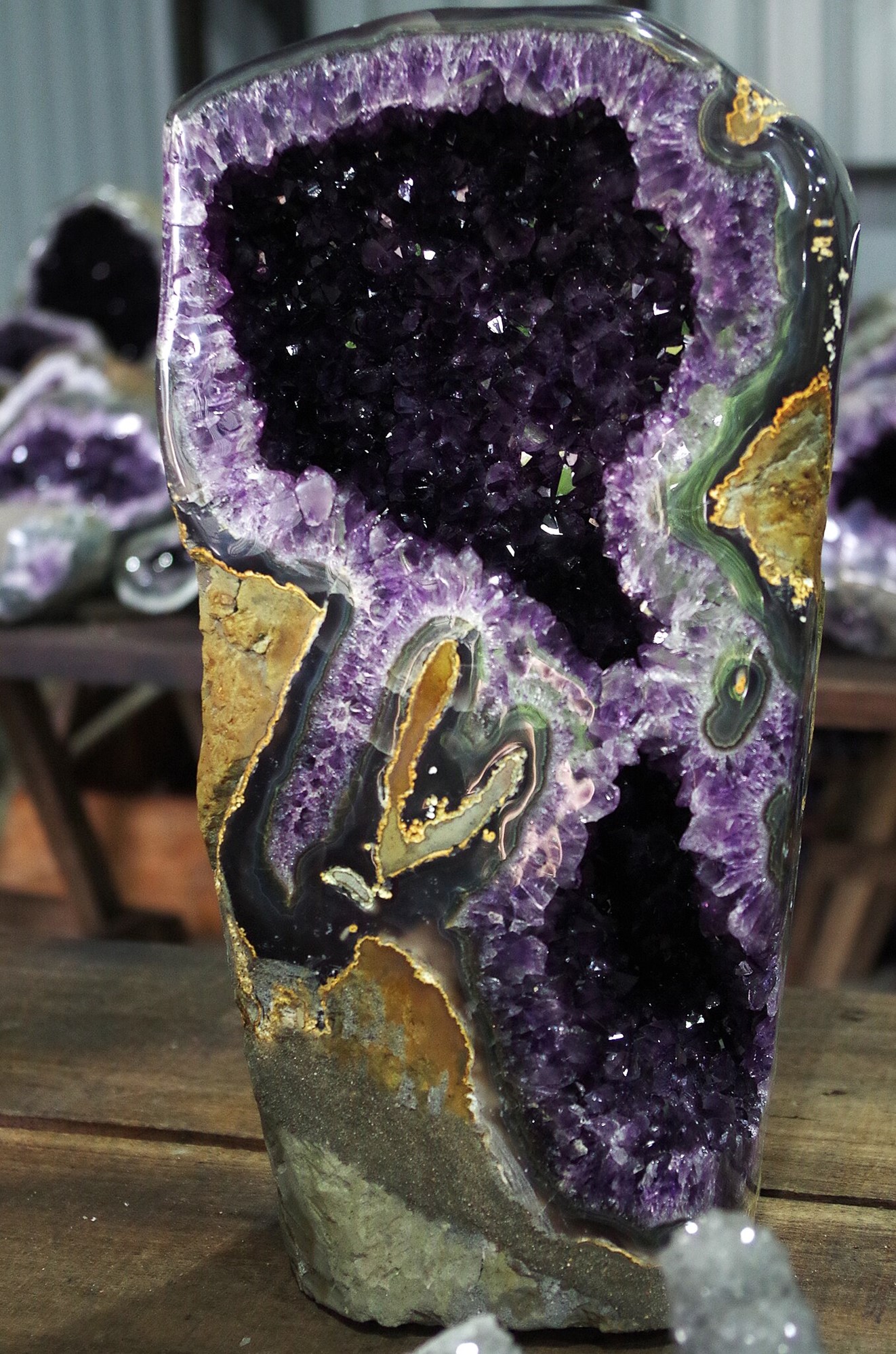 This large geode filled with deep purple amethyst.